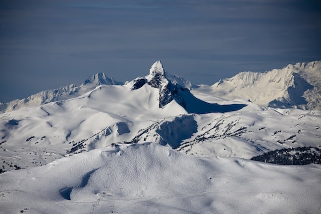 Symphony chair on Whistler mountain in the foreground, the scenic Black Tusk behind, BC Coastal Mountains.