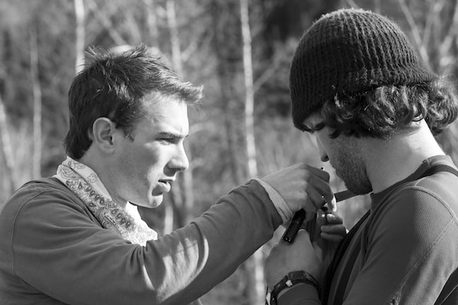 Tim Myers miking up Matt our guide from Ferny Catboarding for an interview