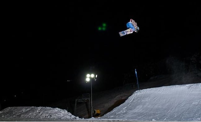 Jye Kearney sends it during the Perisher Nighttime slopestyle Series Image:: Courtesy of Burton Australia
