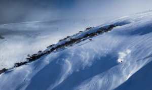 Drew Jolowicz smoking it up in Avy Gully, Mt Hotham. Consistency has been key this season after regular top-ups during July has left Reggae Elliss weak at the knees. Photo: Mark Tsukasov