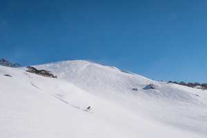 Awesome August - the month that just kept on giving us powder runs, like this one being had by Russ Henshaw at Perisher. Photo:: Perisher