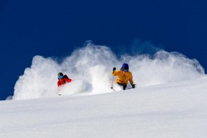 Andrew Pollard chasing his sister Jacqueline through some awesome Alta powder this week, Photo: Sam Watson @samwatsonphotos