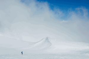 Cody Townsend on the Main Range last winter as the weather closes in. 15 minutes earlier it was bluebird, bit Cody knows how to use a compass. Photo: Jake McBride/Le Bent