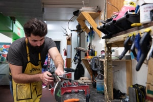 Anton carefully tuning his skis at home in the Pension Grimus Ski Centre, Mt Buller. Photo: Tony Harrington