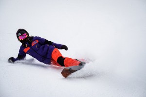 Michaela laying it over in som fresh pow. Photo: