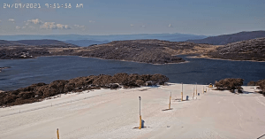Falls Creek's Drovers Dream camera showing a good late season cover, but strong winds saw chairlifts on wind hold this morning.