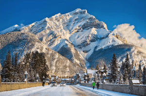 You’d be forgiven for thinking this photo of Banff Avenue was an oil painting. Image:: Banff & Lake Louise Tourism/Paul Zizka