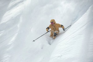 Yuki Kanitani enjoying a brief moment of sunshine in NIesko this week. The Grasshopper is calling  more snow and more powder days over the next week. Photo: Sea and Summit Media