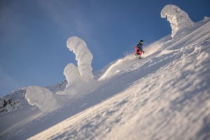 Andrew Daly finding fresh snow and fine weather in Big White on Tuesday  when the Cliff Chair opened for the fist time this season. Photo: Andrew Jo / Big White
