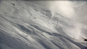 A fresh cover and snow guns firing in Treble Cone today. Photo: Treble Cone snow cams